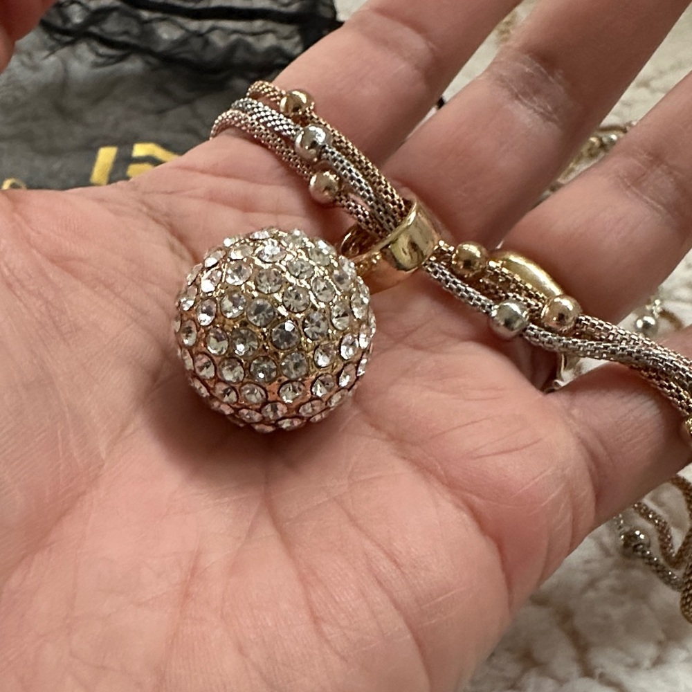 Elegant Gold and Silver Crystal Pendant Necklace